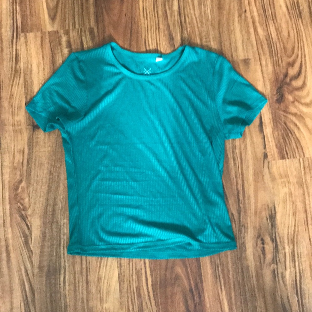 PacSun: plain green t-shirt; has a striped texture